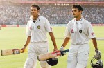 Laxman and Dravid. A bunch of disheartened Australians just out of shot.