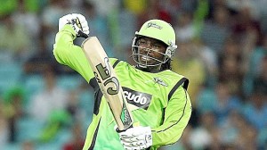 Chris Gayle celebrates reaching double figures