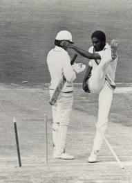 Michael Holding explains the dead ball ruling to the viewers back home.