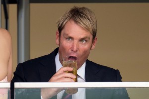 Shane Warne, presumably with a glass of freshly-chundered vomit.